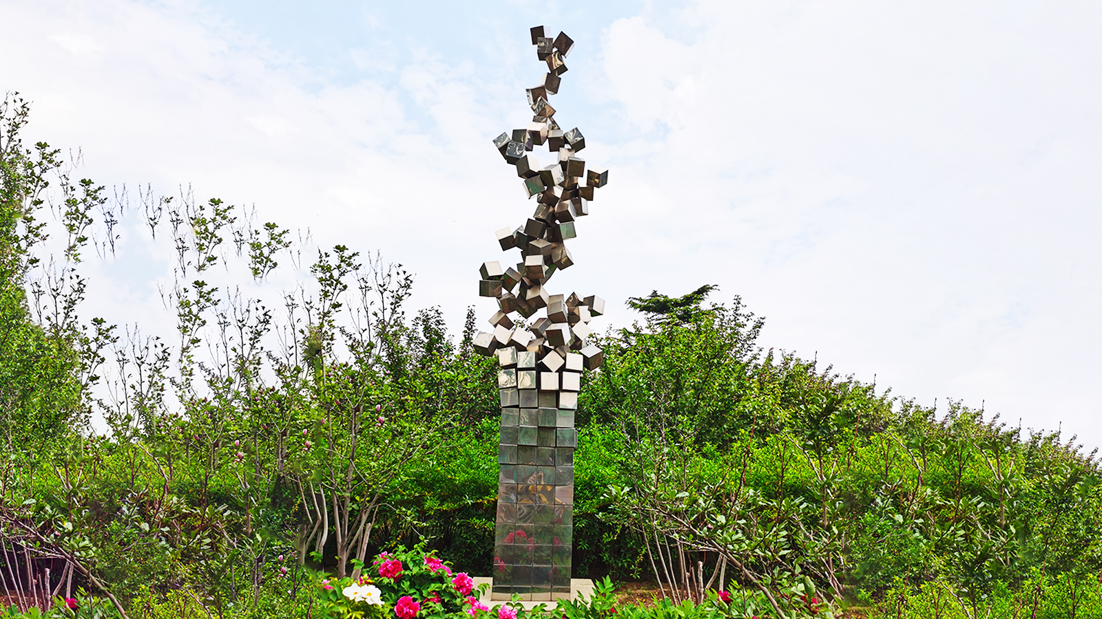 Large outdoor stainless steel deer sculpture